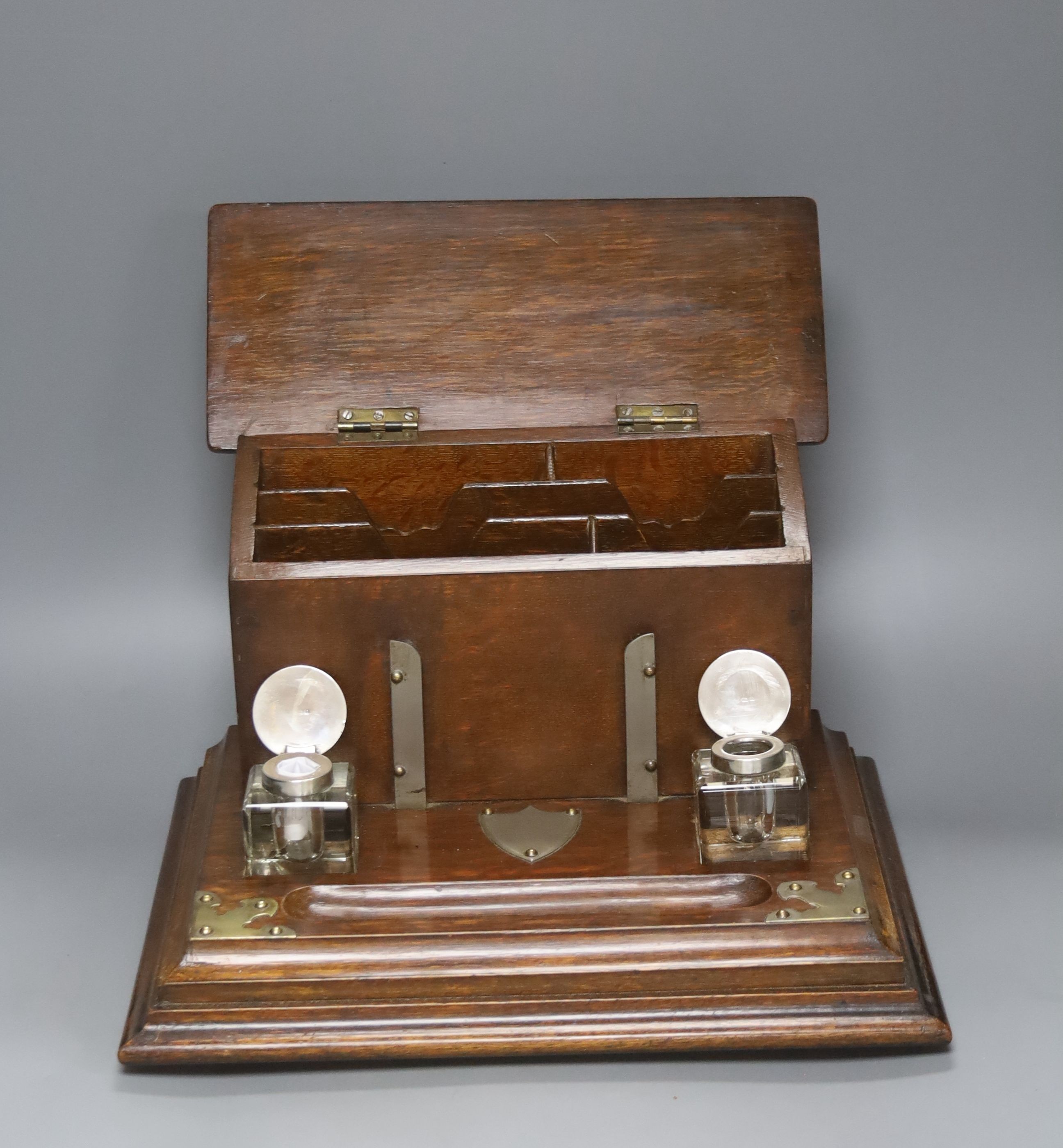A Victorian brass bound oak combination stationary box / inkstand, width 36cm